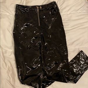 Black patent pants in medium